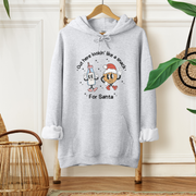 This hoodie features an adorable cartoon bottle of milk and a cookie that are sure to make you feel as sweet as they are. Not only will this hoodie keep you warm and cozy during the chilly winter months, but it will also make you the star of any holiday party. 