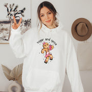 Our gender-neutral hoodie features a cute cartoon gingerbread woman who's ready to take on the world with her trusty belt bag and Stanley tumbler. 