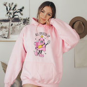 This gender-neutral hoodie is the perfect attire for anyone who wants to look stylish while staying cozy during the winter months. With a cute cartoon Christmas tree wearing a belt bag and holding a Stanley tumbler, this hoodie is sure to bring a smile to everyone's face. 