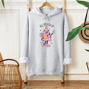This gender-neutral hoodie is the perfect attire for anyone who wants to look stylish while staying cozy during the winter months. With a cute cartoon Christmas tree wearing a belt bag and holding a Stanley tumbler, this hoodie is sure to bring a smile to everyone's face. 