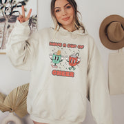 Slip into this cozy gender-neutral hoodie and feel the warmth of the cute cartoon cups of hot chocolate on your chest. It's like wearing a hug, but better because you won't overheat. 