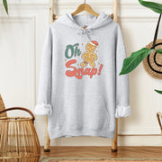 This hoodie features a cute cartoon gingerbread man with a broken leg and the hilarious phrase, "Oh Snap!" printed on the front.