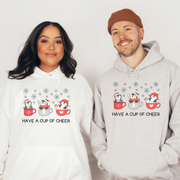 This gender-neutral masterpiece is designed to make you feel like you're wrapped in a warm and fuzzy hug from your favorite penguin pals. With cute cartoon penguins sitting in cups of hot chocolate, this hoodie will make you feel like you're snuggled up with a cup of cheer no matter where you are! 