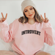 Introducing the ultimate sweatshirt for the cozy and introverted souls out there! Our gender-neutral sweatshirt features the hilarious and relatable saying "Introvert." - because let's be real, who needs a social life when you can have a Netflix marathon in your pajamas? Made with the softest and most comfortable material, this sweatshirt will feel like a warm hug from your couch.