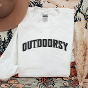 Introducing the ultimate sweatshirt for all the nature lovers out there! Our gender-neutral sweatshirt with the saying "Outdoorsy" is the perfect addition to your adventure attire. Whether you're hiking up a mountain or roasting marshmallows around the campfire, this sweatshirt will keep you warm and stylish.