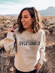 Introducing the gender-neutral sweatshirt designed specifically for the ultimate overthinker - the Professional Overthinker! This sweatshirt is the perfect addition to your wardrobe if your favorite pastime is pondering the meaning of life, or if you're the type to analyze every little detail until you're blue in the face. Made with the softest and coziest materials, this sweatshirt will keep you warm and comfortable as you overthink your way through the day. 