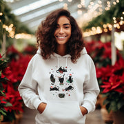 Introducing the purrfect cozy sweater for the festive season- our gender neutral black cat hoodie! This sweater is sure to bring a smile to your face with its adorable design featuring black cats doing funny Christmas things. 
