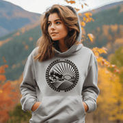 This gender-neutral hoodie features a stunning Manitoba farmers field graphic with a breathtaking sunset, which captures the essence of the province's beauty. 