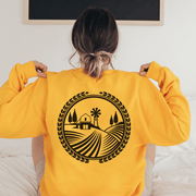  The Prairie Harvest sweatshirt features a stunning graphic of a Manitoba farmers field, paying homage to the beautiful prairie landscape. 