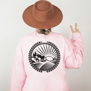Our gender neutral sweatshirt features a stunning graphic of a Manitoba farmer's field at sunset, capturing the essence of the province's rich agricultural heritage. 