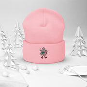 Introducing the perfect winter accessory that will make you the envy of all your friends - the gender-neutral beanie with a cute Christmas tree cake holding a Stanley water bottle and wearing a belt bag! 
