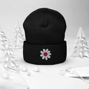 Our gender-neutral beanie is not only super cozy and comfortable to wear, but it also features an embroidered happy face daisy that will make you smile every time you put it on. 