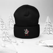 Introducing the perfect winter accessory that will make you the envy of all your friends - the gender-neutral beanie with a cute Christmas tree cake holding a Stanley water bottle and wearing a belt bag! 