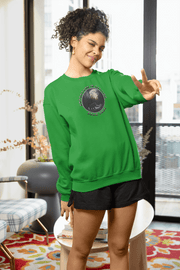This gender neutral crewneck sweatshirt features a stunning design of a grizzly bear roaming on a campsite with the moon shining behind it. The saying "Adventure Is Calling Roam Free" is printed boldly, capturing the essence of the great outdoors and the spirit of camping. Perfect for any outdoor adventure