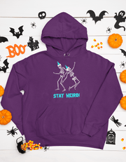 Introducing the perfect hoodie for those who like to stay weird! Our gender-neutral hoodie features not one, but two skeletons acting silly and wearing party hats. These skeletons know how to have a good time and they're inviting you to join in on the fun. 