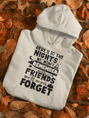 Introducing our gender neutral camping-themed hoodie with a statement that captures the essence of unforgettable memories shared with friends. The hoodie is made from high-quality materials ensuring long-lasting comfort and durability. It features a stylish design with a camping-inspired graphic and the phrase "Here's To The Nights We Won't Remember With Friends We'll Never Forget" printed in bold letters. 