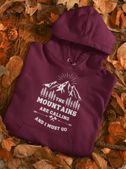 Introducing our new gender-neutral hoodie, perfect for outdoor enthusiasts! Featuring a mountain theme and the inspiring quote "The Mountains Are Calling And I Must Go", this hoodie is made with high-quality materials to keep you warm and comfortable on your next adventure. 