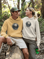 This gender neutral hoodie features a stunning design of a grizzly bear roaming on a campsite with the moon shining behind it. The saying "Adventure Is Calling Roam Free" is printed boldly, capturing the essence of the great outdoors and the spirit of camping. 