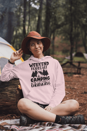 Introducing our latest gender neutral hoodie, perfect for any camping enthusiast! This cozy hoodie features a hilarious camping graphic and the saying "Weekend Forecast - Camping With A Good Chance Of Drinking" - because let's be real, what's a camping trip without a little indulgence? 
