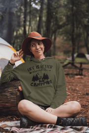 Introducing our gender neutral hoodie featuring a fun camping graphic and the uplifting message "Life Is Better Around The Campfire." Made with high-quality materials, this hoodie is perfect for outdoor enthusiasts who want to stay stylish and comfortable while enjoying the great outdoors.