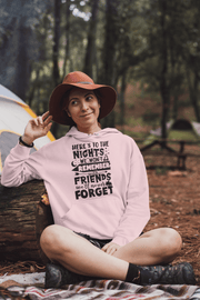 Introducing our gender neutral camping-themed hoodie with a statement that captures the essence of unforgettable memories shared with friends. The hoodie is made from high-quality materials ensuring long-lasting comfort and durability. It features a stylish design with a camping-inspired graphic and the phrase "Here's To The Nights We Won't Remember With Friends We'll Never Forget" printed in bold letters. 