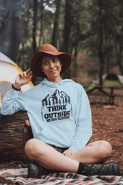 Introducing our gender-neutral hoodie featuring a stunning mountain scene and the inspiring phrase "Think Outside - No Box Required." This hoodie is perfect for adventure seekers who love hiking and the great outdoors.