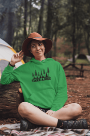 Introducing our gender-neutral hoodie featuring a stunning forest scene and the motivational slogan "Take A Hike". This cozy and stylish hoodie is perfect for any adventure seeker, whether hitting the trails for a day hike or embarking on a longer journey. 