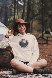 This gender neutral hoodie features a stunning design of a grizzly bear roaming on a campsite with the moon shining behind it. The saying "Adventure Is Calling Roam Free" is printed boldly, capturing the essence of the great outdoors and the spirit of camping. 