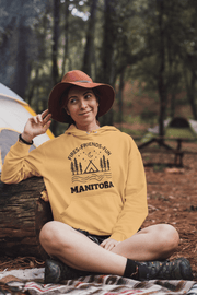 Introducing the perfect hoodie for all your outdoor adventures! This gender-neutral hoodie with a camping theme and Manitoba on it is the ultimate companion for all your camping trips. 