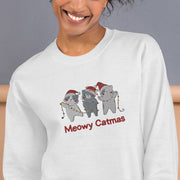 Our gender-neutral Meowy Catmas sweatshirt is the ultimate combination of cute and cozy - just like your feline friends. With adorable embroidered Christmas cats tangled up in festive Christmas lights, this sweatshirt is sure to bring a smile to anyone's face. 